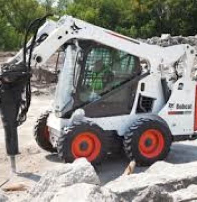 Bobcat – S450 W/Jack Hammer and Bucket.  (Trailer Additional)